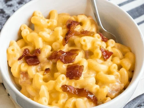 mac and cheese topped with bacon bits