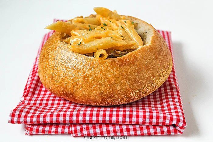 Bread bowl with penne pasta