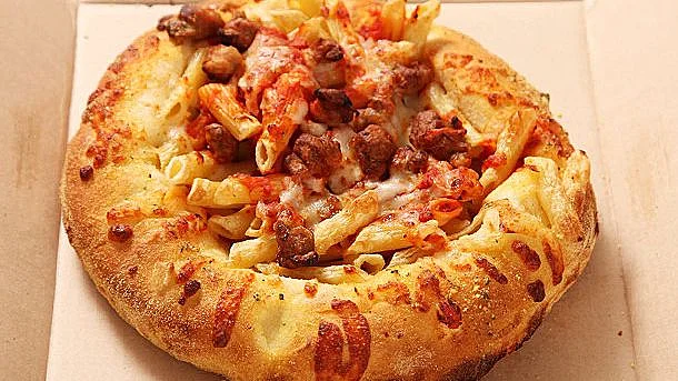 Full-fledged bread bowl with penne pasta