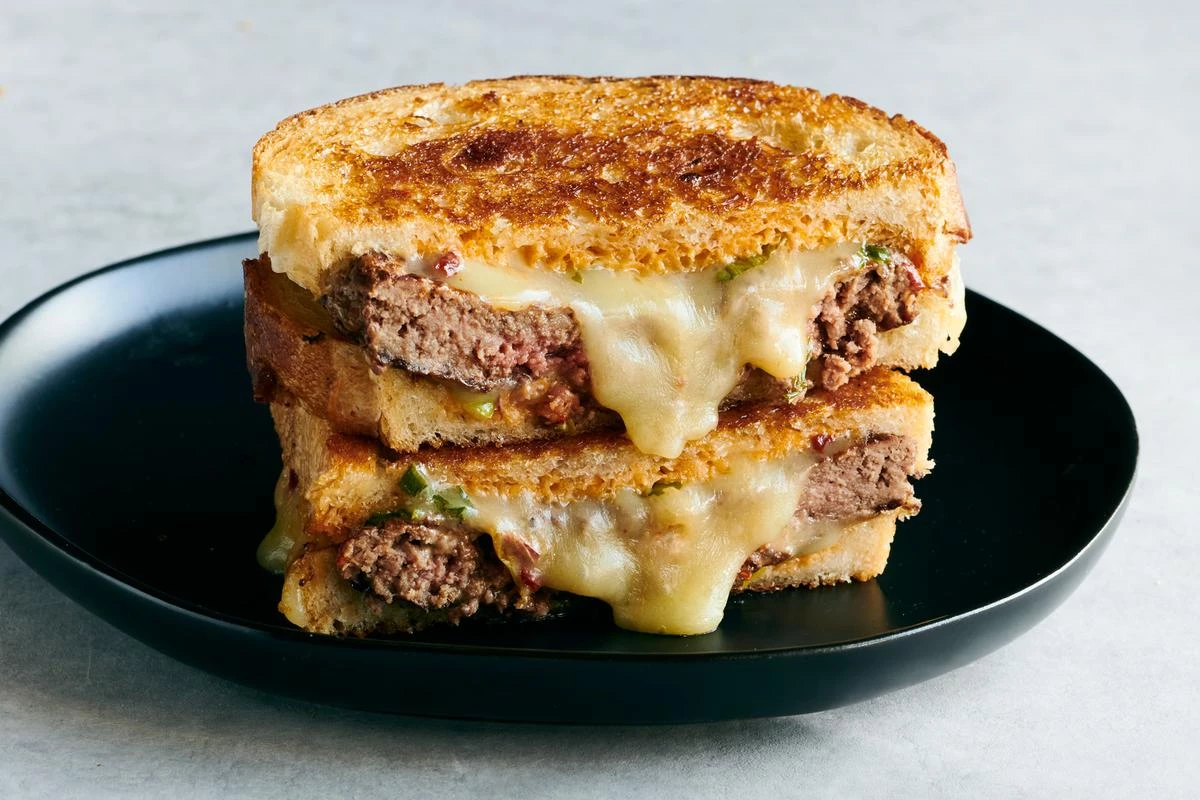 patty melt with flavorful beef patties and crispy onions